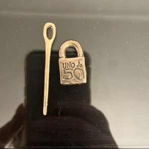 Uno de 50 charms
